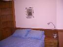 DORMITORIO REVESTIDO EN MADERA.JPG